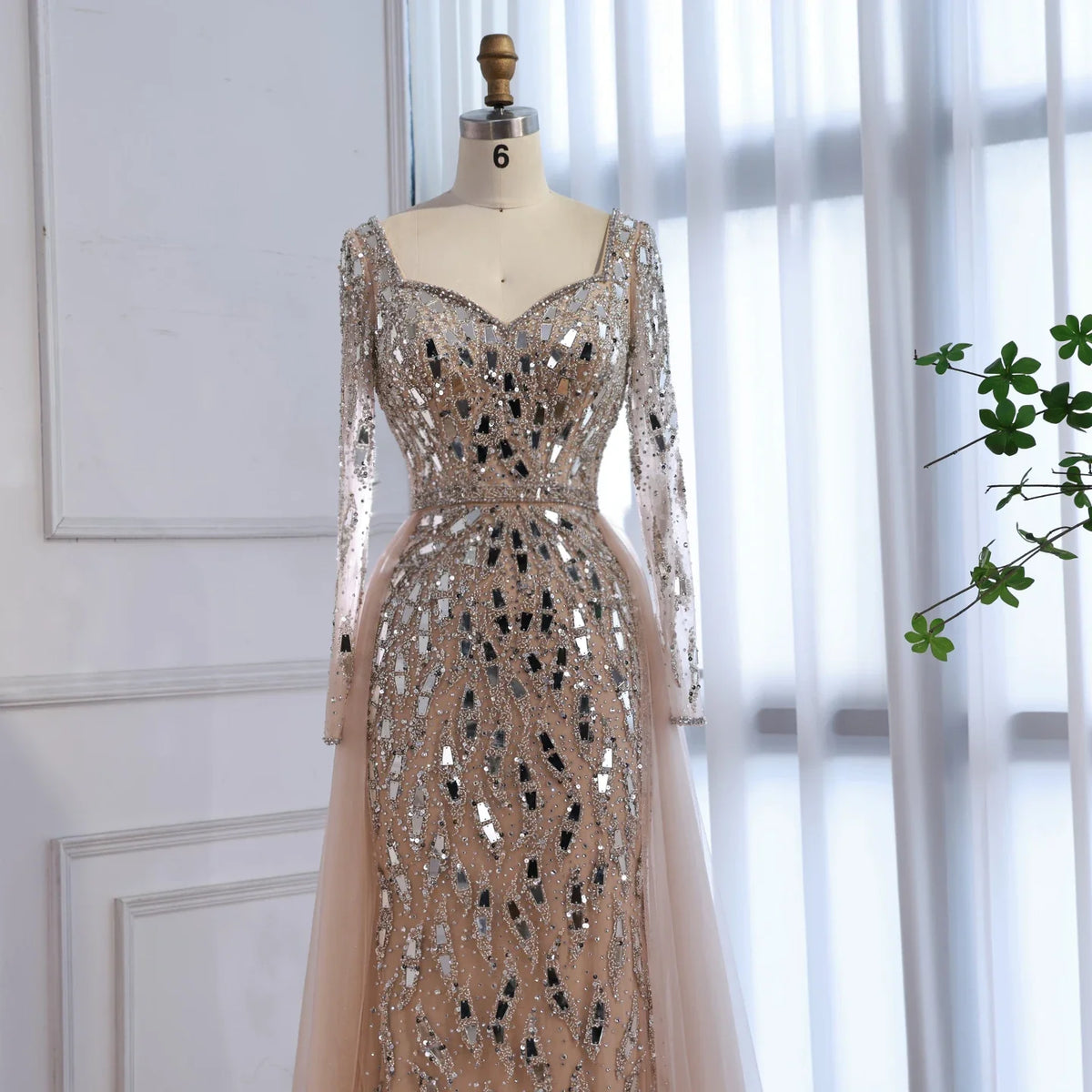 Elegant MC Luxury Arabic dress by MC THE BLACK DIAMOND, featuring intricate embroidery and flowing fabric.
