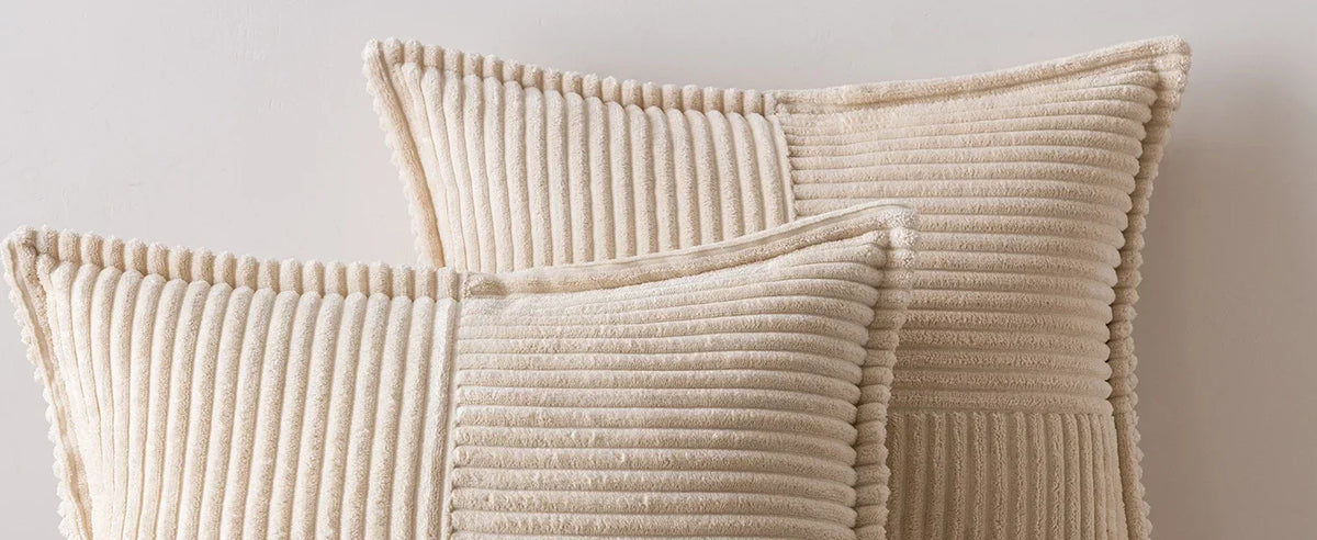 Boho striped pillow cover from MC The Black Diamonds, decorative cushion for sofa, featuring colorful woven stripes and textured fabric.