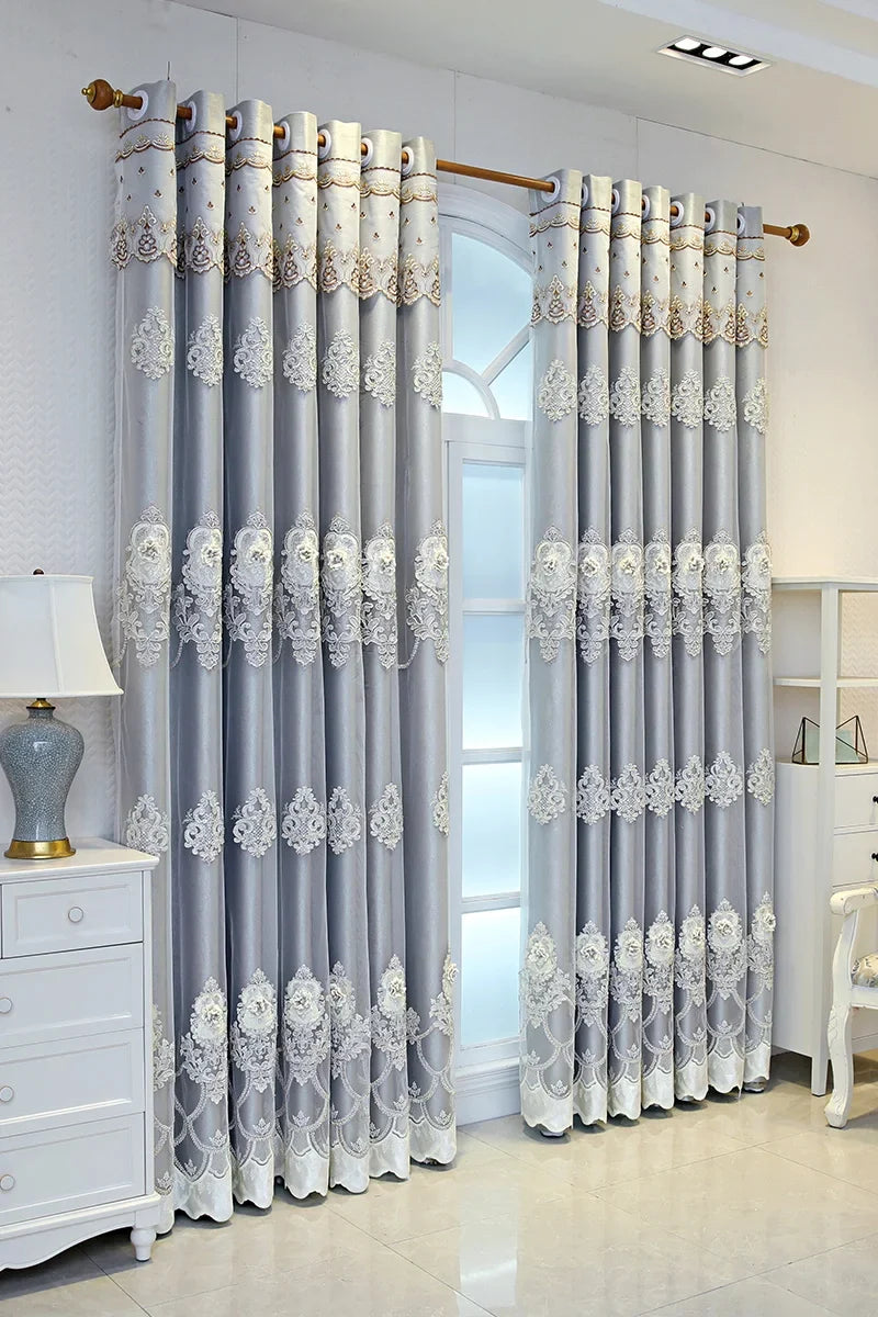 Elegant black blackout curtains with embossed base and 3D embroidery, perfect for bedroom or living room decor.