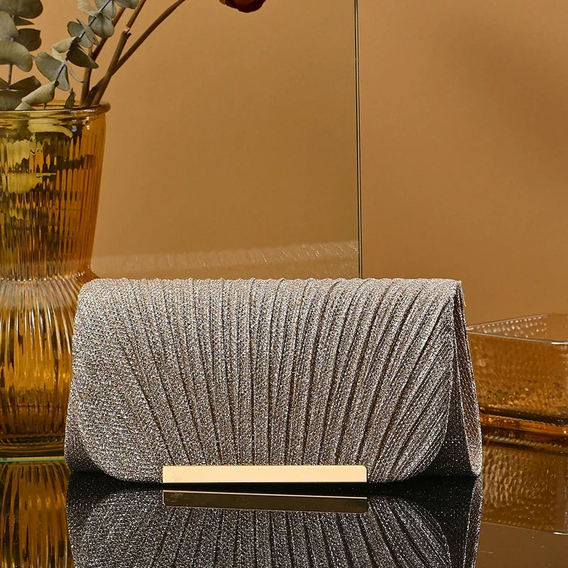 Silver wedding clutch bag by 𝕄𝕔 𝕋𝕙𝕖 𝔹𝕝𝕒𝕔𝕜 𝔻𝕚𝕒𝕞𝕠𝕟𝕕