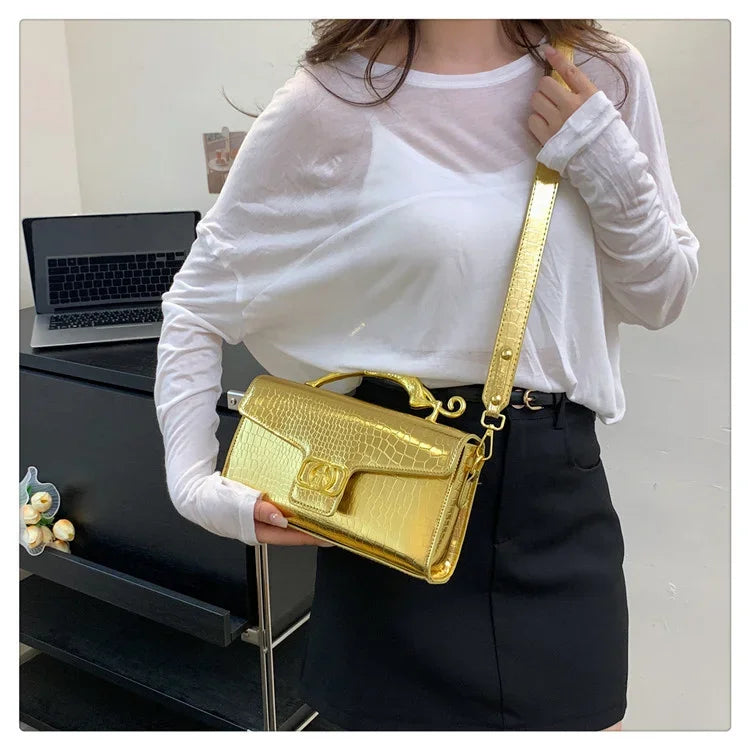 Women luxury leather shoulder bag by MC THE BLACK DIAMOND featuring a metal buckle and stylish design, perfect for parties and fashion.