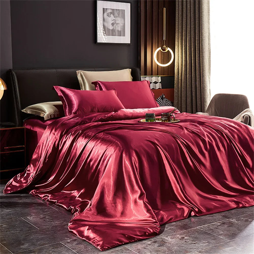 Luxurious solid silk bedding set with duvet cover, bed sheet, and pillowcases by MC THE BLACK DIAMOND, suitable for king, queen, or twin beds.