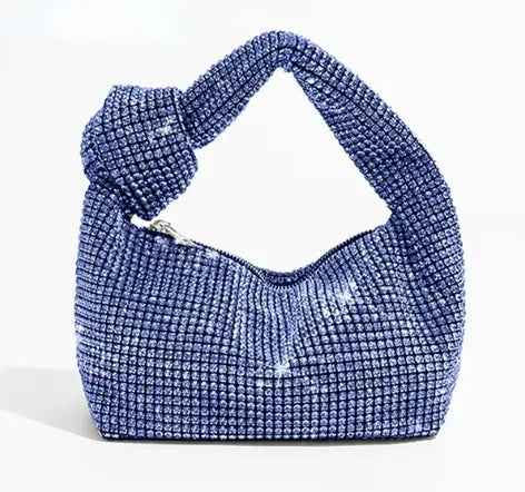 Silver crystal handle evening bag with rhinestone knot design by MC THE BLACK DIAMOND, luxury top handle purse for women.