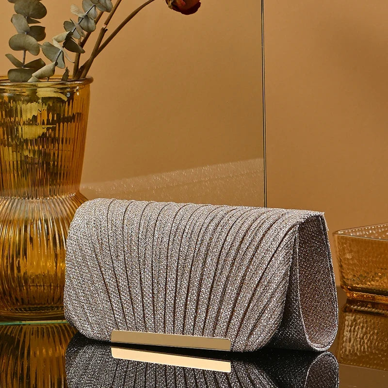 Silver bridal clutch bag by 𝕄𝕔 𝕋𝕙𝕖 𝔹𝕝𝕒𝕔𝕜 𝔻𝕚𝕒𝕞𝕠𝕟𝕕