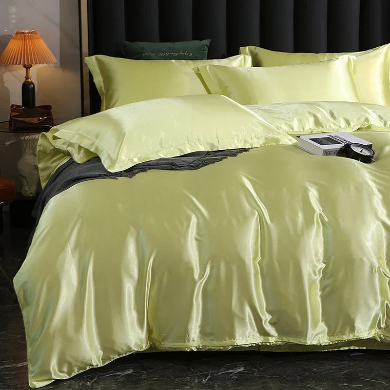 Luxury satin bedding set with fitted sheet and duvet cover by MC THE BLACK DIAMOND, showcasing smooth, elegant home decor for a bedroom.