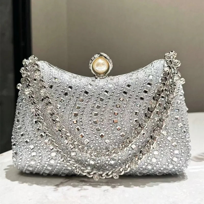 MC THE BLACK DIAMOND evening clutch bag with rhinestone diamond inlay, gold and silver finish, perfect for weddings and parties.