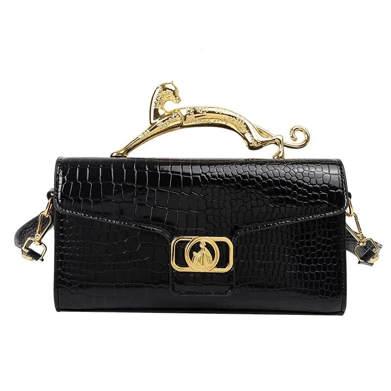 Women’s luxury MC THE BLACK DIAMOND leather handbag with metal buckle, stylish shoulder bag for parties and casual wear.