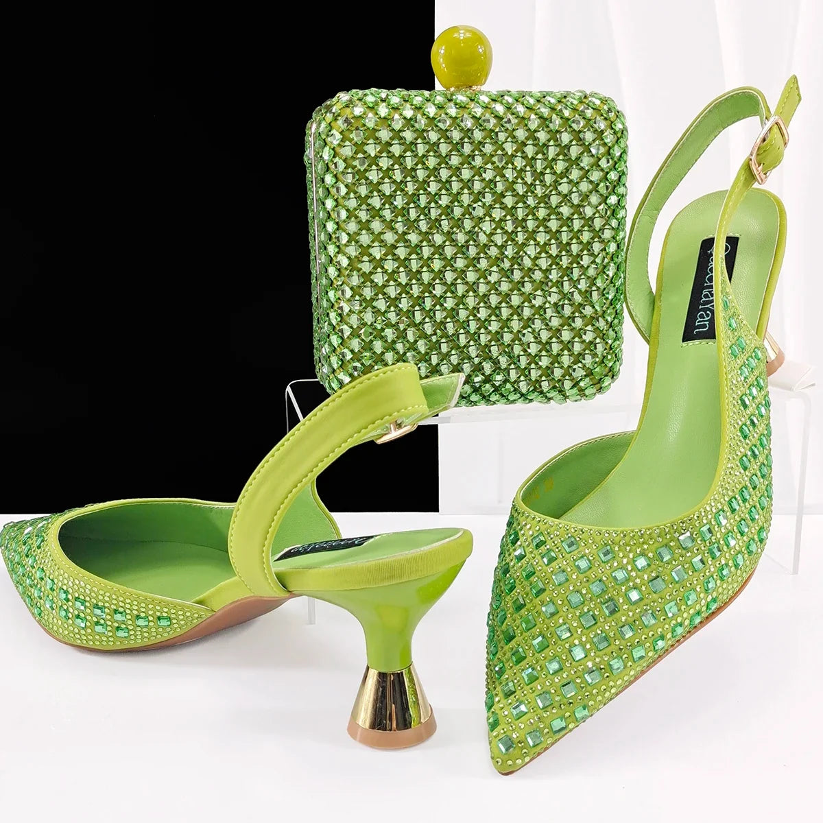 Elegant MC THE BLACK DIAMOND heels and matching bag set for women, perfect for parties and weddings, with silver accents.