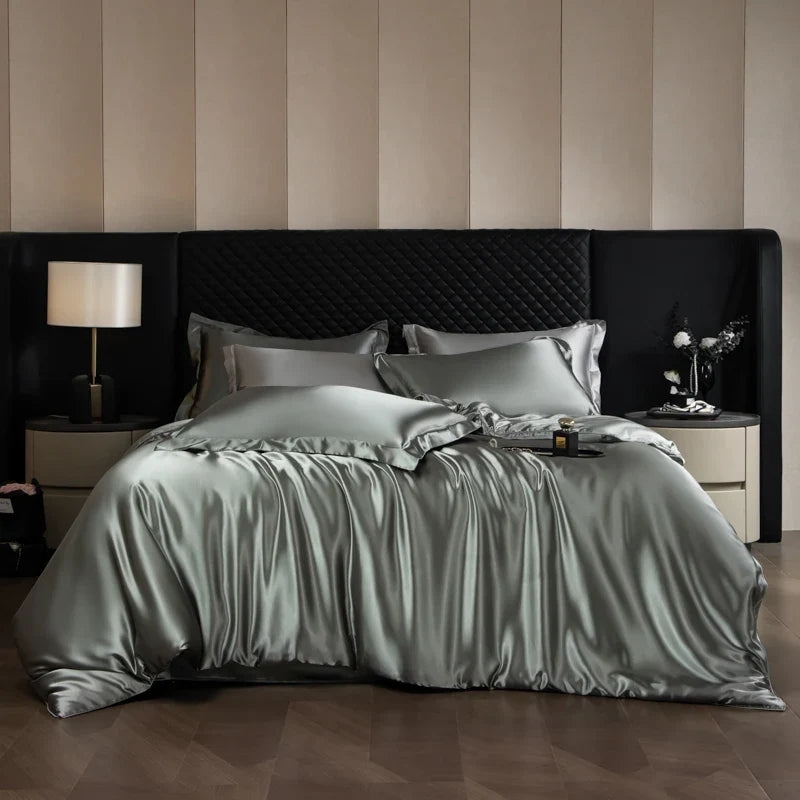 Luxurious silk bed sheets set with duvet cover, fitted sheet, flat sheet, and pillowcases in king and queen sizes from MC The Black Diamonds.