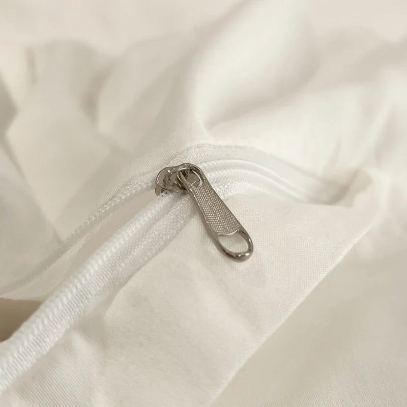 White luxury hotel bedding set by MC THE BLACK DIAMOND with thick brushed bed sheets, showcasing soft, plush bedding for a upscale look.
