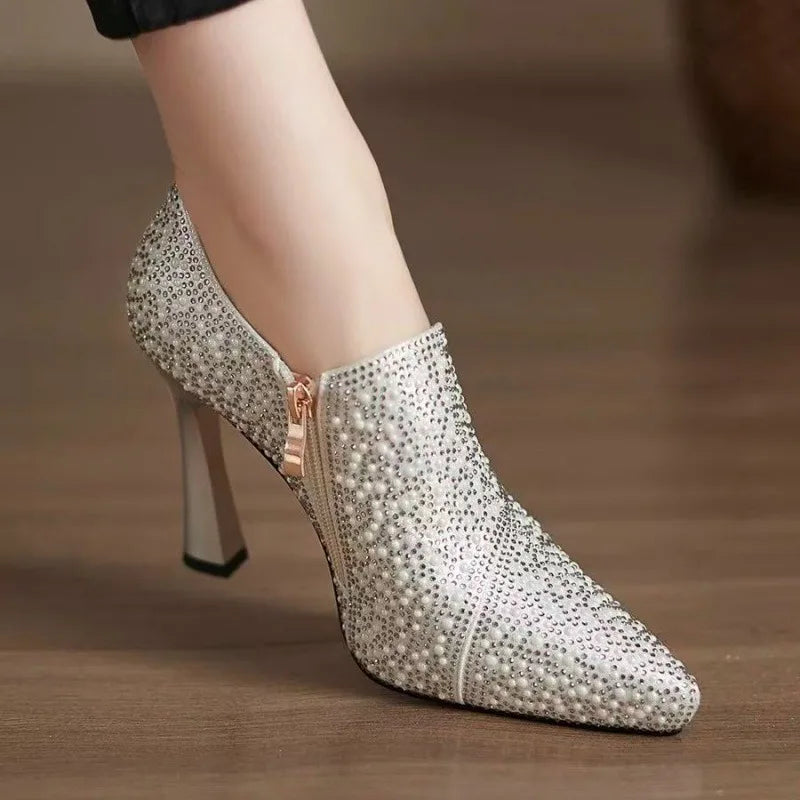 Luxury Mohamamd Collection rhinestone high heels with pointed toes, pearls, crystals, and champagne color for bridal or formal occasions.