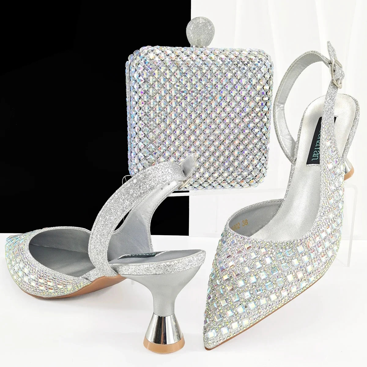 MC THE BLACK DIAMOND doershow charming heels and matching bag set for women, perfect for party and wedding occasions.