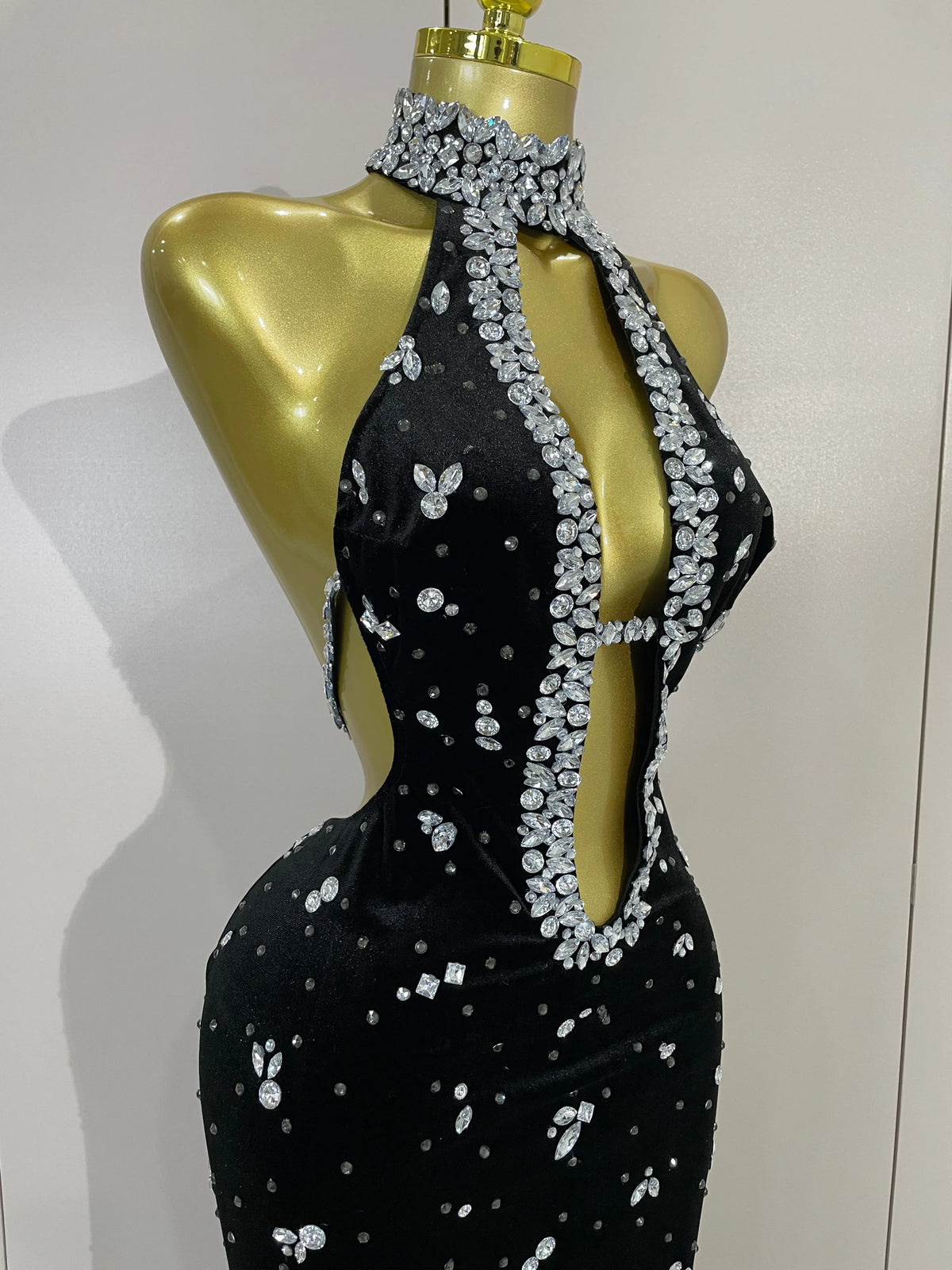 Sparkly velvet dress by MC THE BLACK DIAMOND, featuring a glamorous fit and shimmering fabric perfect for evening wear.