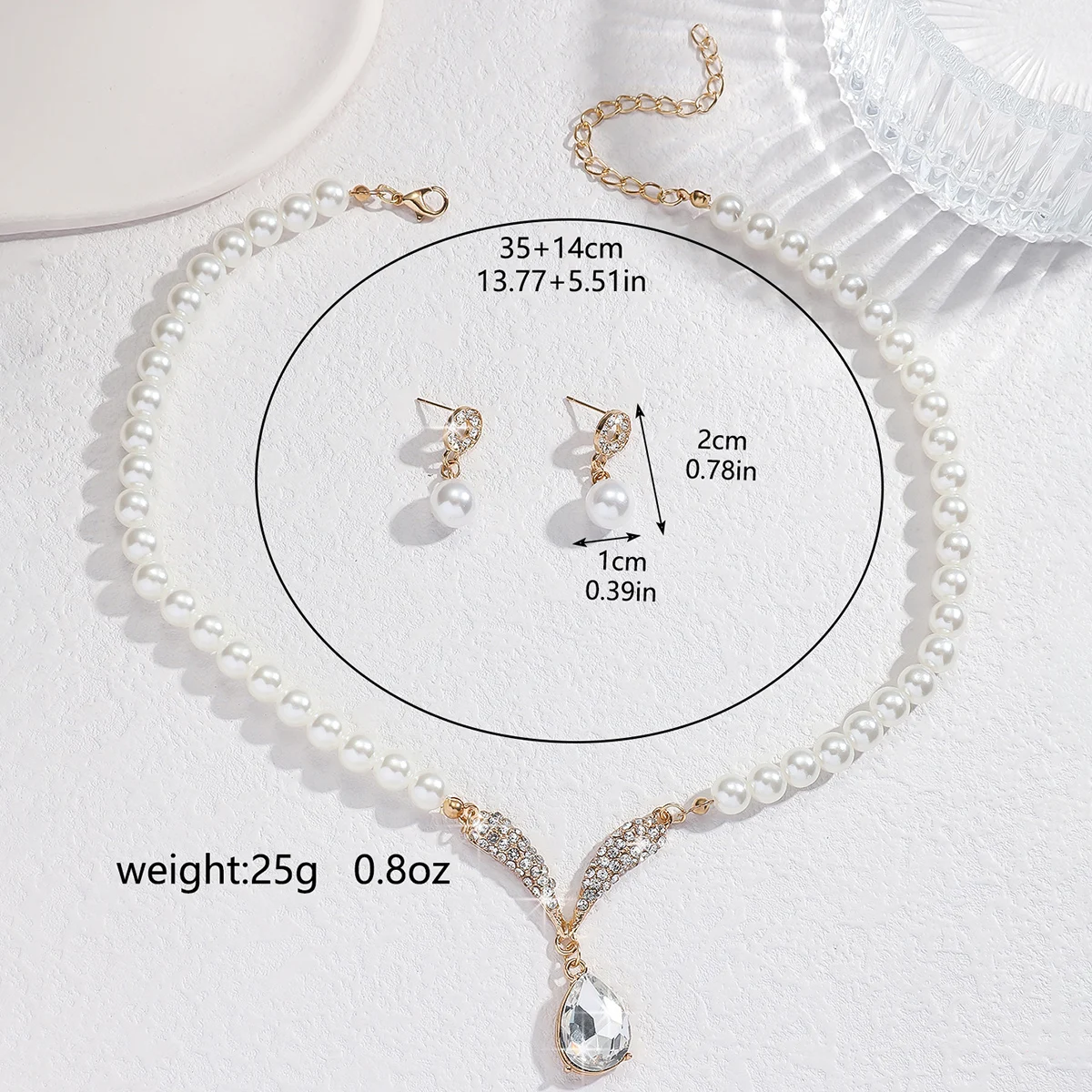 Mohammad Collection 3-piece pearl droplet necklace and earrings set in gold, perfect for weddings and special occasions.