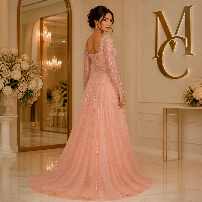 Elegant MC Luxury Pink Dubai evening dress by MC THE BLACK DIAMOND, showcasing a flowing fabric and intricate design.