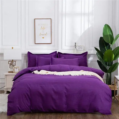 Black quilt set by MC THE BLACK DIAMOND featuring a double, queen, and king size bedding with solid color comforter and duvet cover.