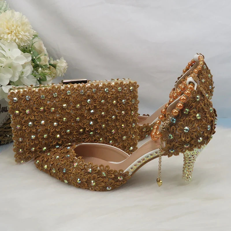 Coffee-colored lace flower wedding heels and matching purse set with pointed toes, ankle straps, and pearl details.