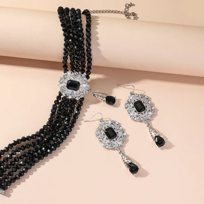 Vintage multicolored crystal necklace with geometric hollow alloy earrings, featuring green, red, blue, black for women’s wedding jewelry sets.