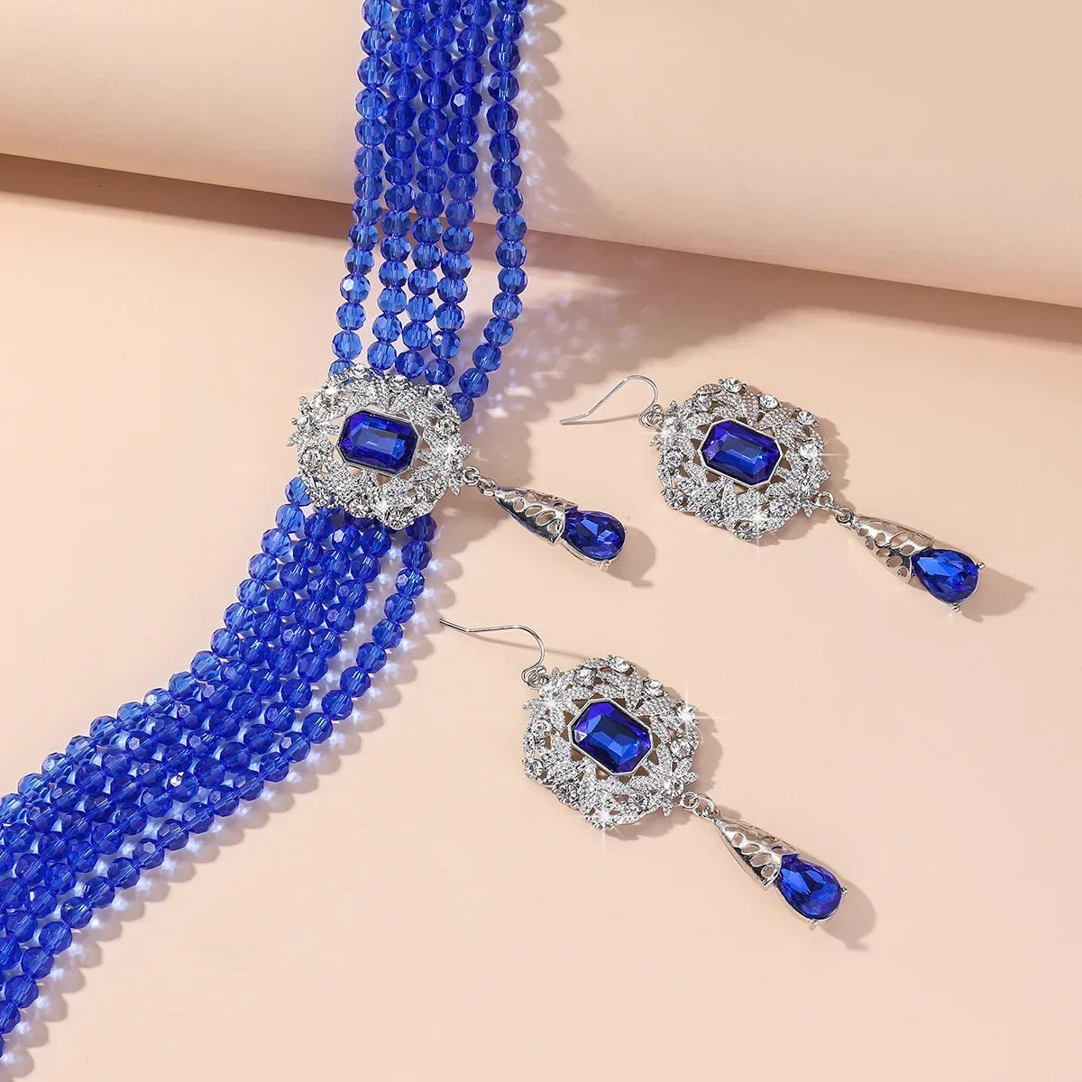 Vintage MC THE BLACK DIAMOND green, red, blue crystal necklace with geometric hollow alloy earrings for women’s wedding and banquet jewelry.