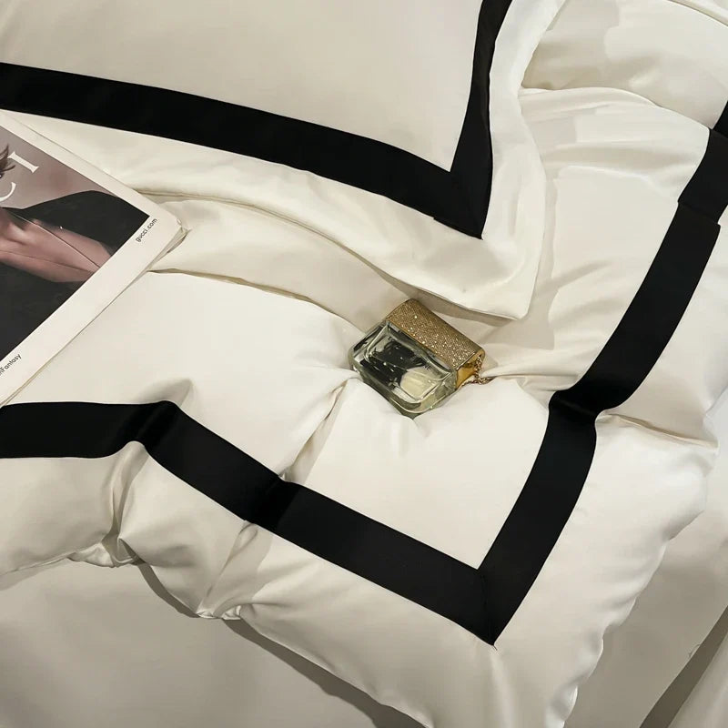 Luxury MC THE BLACK DIAMOND hotel bedding set with thick brushed white bedsheets, showcasing soft, plush fabric and neatly arranged layers.