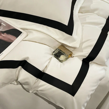 Luxury MC THE BLACK DIAMOND hotel bedding set with thick brushed white bedsheets, showcasing soft, plush fabric and neatly arranged layers.