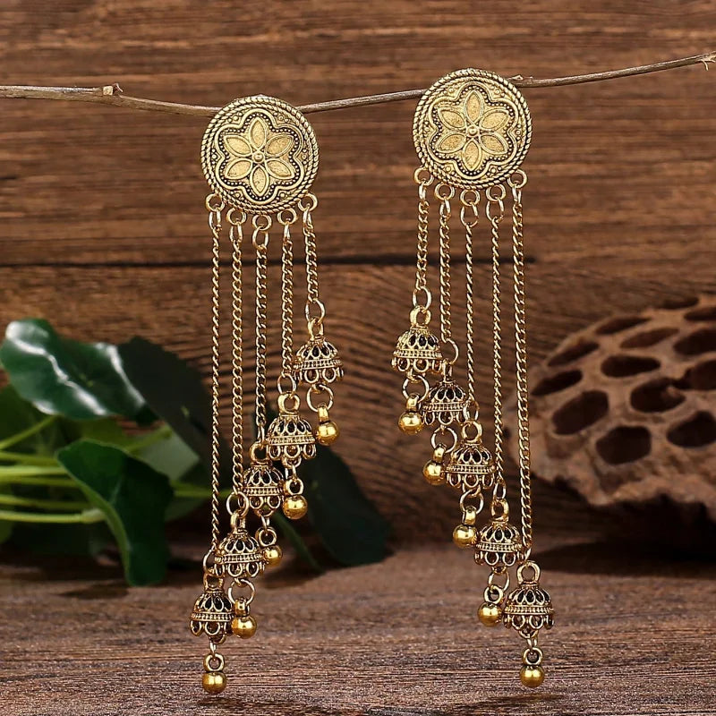 Vintage bohemian bell earrings with colorful tassels and floral design, showcasing ethnic style by 𝕄𝕔 𝕋𝕙𝕖 𝔹𝕝𝕒𝕔𝕜 𝔻𝕚𝕒