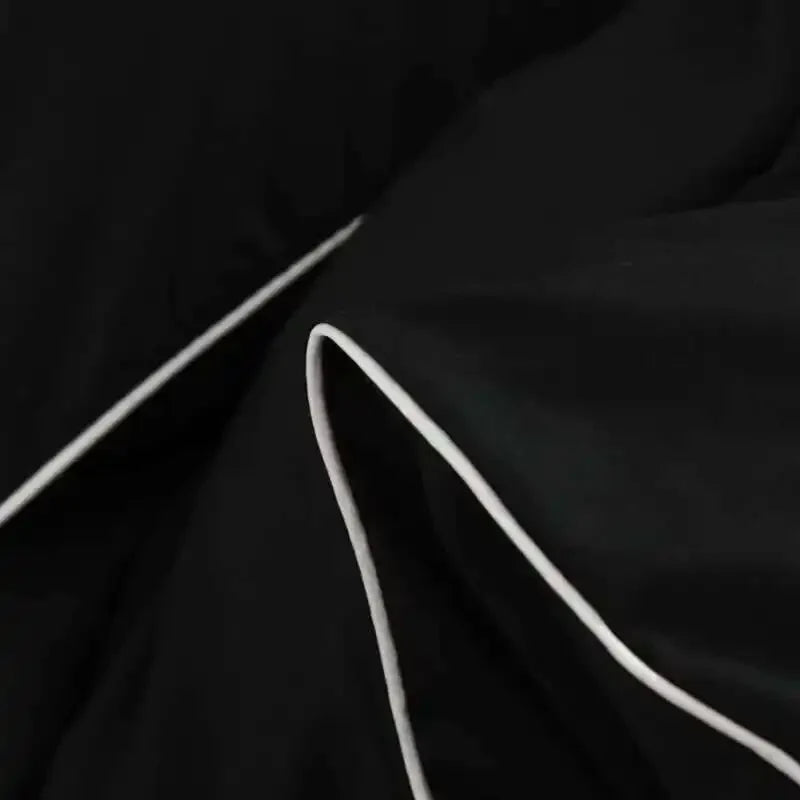 Black bedding set with minimalist quilt design from 𝕄𝕔 𝕋𝕙𝕖 𝔹𝕝𝕒𝕔𝕜 𝔻𝕚𝕒𝕞𝕠𝕟