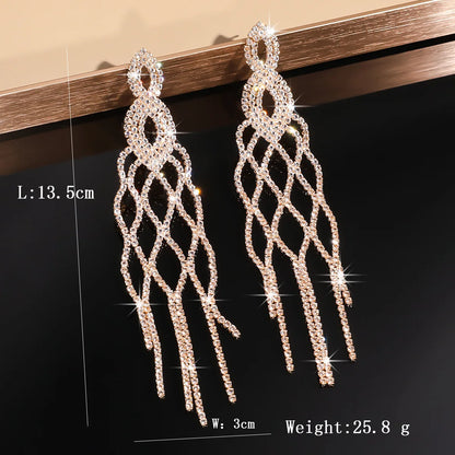 MC THE BLACK DIAMOND long tassel rhinestone drop earrings with geometric crystal dangles for women, perfect for parties and weddings.