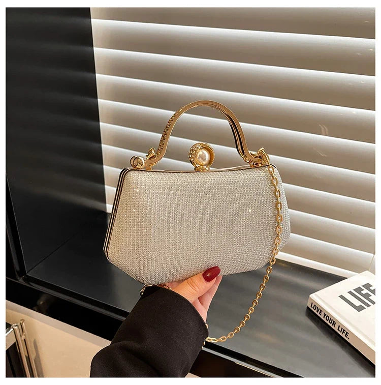 Black Mc The Diamonds hand bag with solid color, chain strap, simple design, versatile evening bag for women.