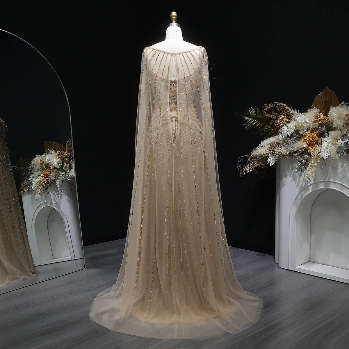 Elegant formal evening dress by MC THE BLACK DIAMOND, featuring a sleek black design and sophisticated style.