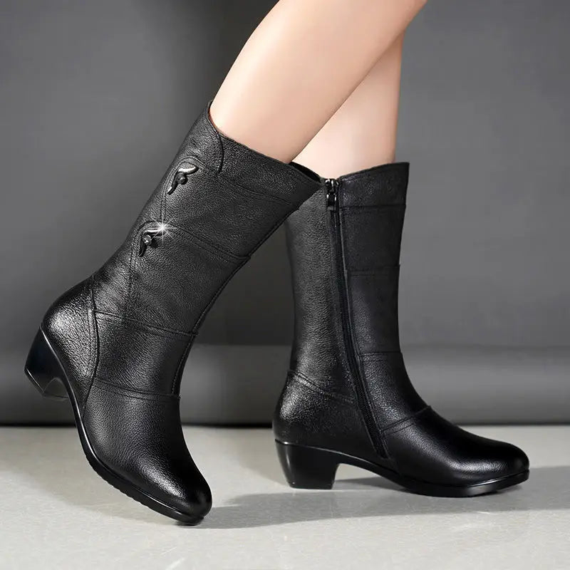 Women’s mid-calf leather boots with wedge heels from Mohamad Collection, perfect for winter, featuring soft leather and stylish design.
