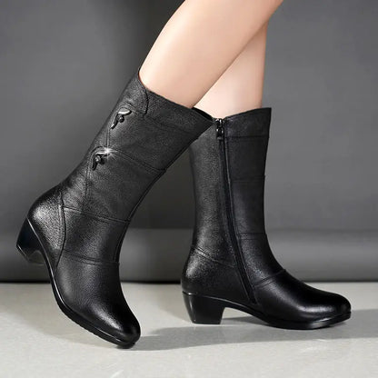 Women’s mid-calf leather boots with wedge heels from Mohamad Collection, perfect for winter, featuring soft leather and stylish design.
