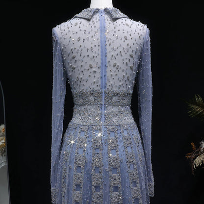 Elegant MC THE BLACK DIAMOND MC long sleeve formal evening dress with intricate detailing and a sleek silhouette.