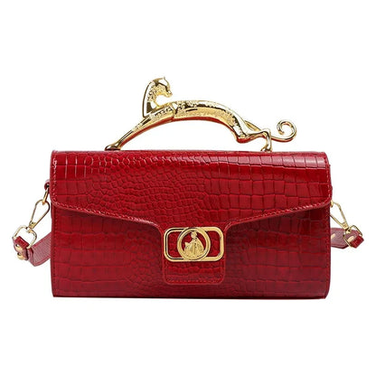 Women luxury leather shoulder bag by MC THE BLACK DIAMOND featuring a metal buckle, simple fashion design, ideal for parties and events.