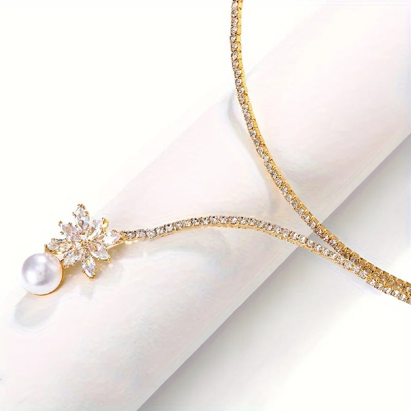 Elegant vintage-inspired Pearl and zirconia flower pendant necklace from 𝕄𝕔 𝕋𝕙𝕖 𝔹𝕝𝕒𝕔𝕜 𝔻𝕚𝕒𝕞𝕠