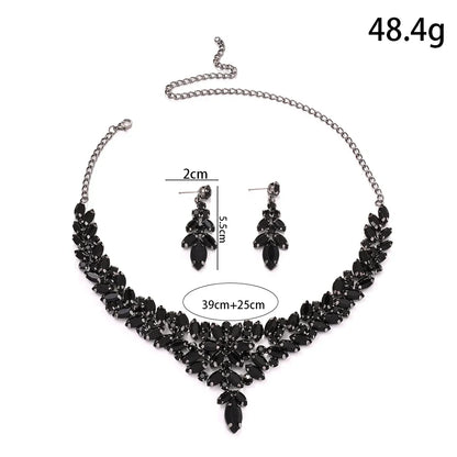 MC THE BLACK DIAMOND jewelry set featuring black leaf design, crystal accents, necklace and earrings for wedding or boho style.