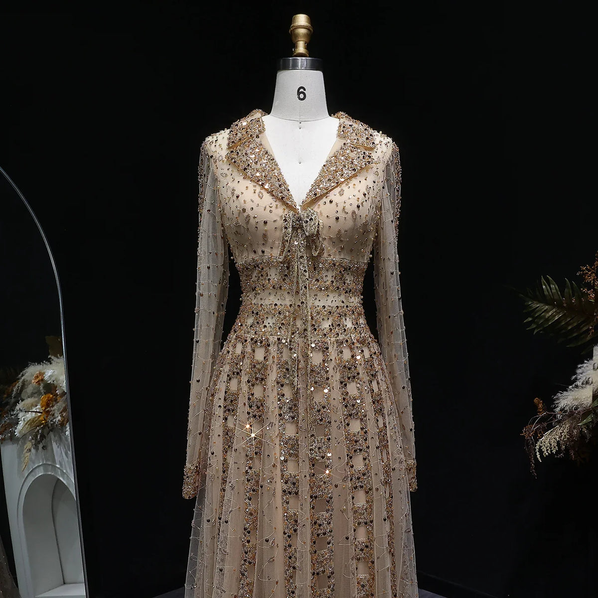 Elegant MC THE BLACK DIAMOND MC long sleeve formal evening dress with a sleek design and sophisticated fit.