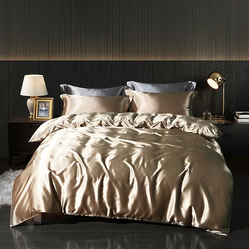 Luxury satin bedding set with fitted sheet and duvet cover by MC THE BLACK DIAMOND, showcasing smooth, elegant home decor.