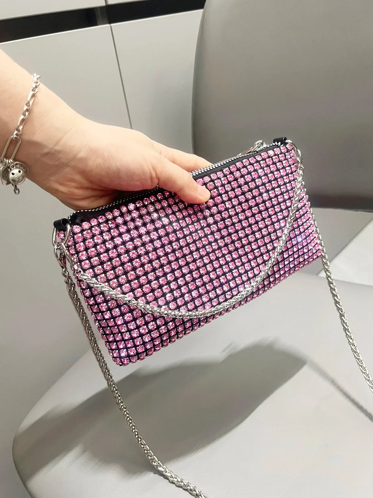 Luxury MC THE BLACK DIAMOND rhinestones clutch purse with handle, elegant designer women’s shoulder bag and hand bag in black.