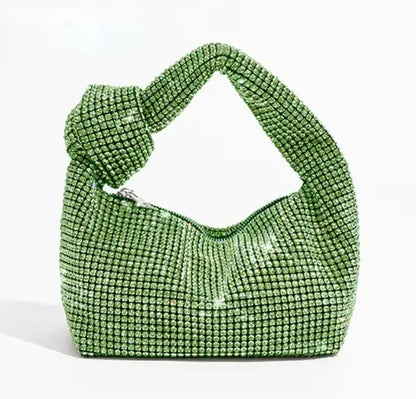 Silver crystal handle evening bag with rhinestone knot design, luxury MC THE BLACK DIAMOND designer tote for women.