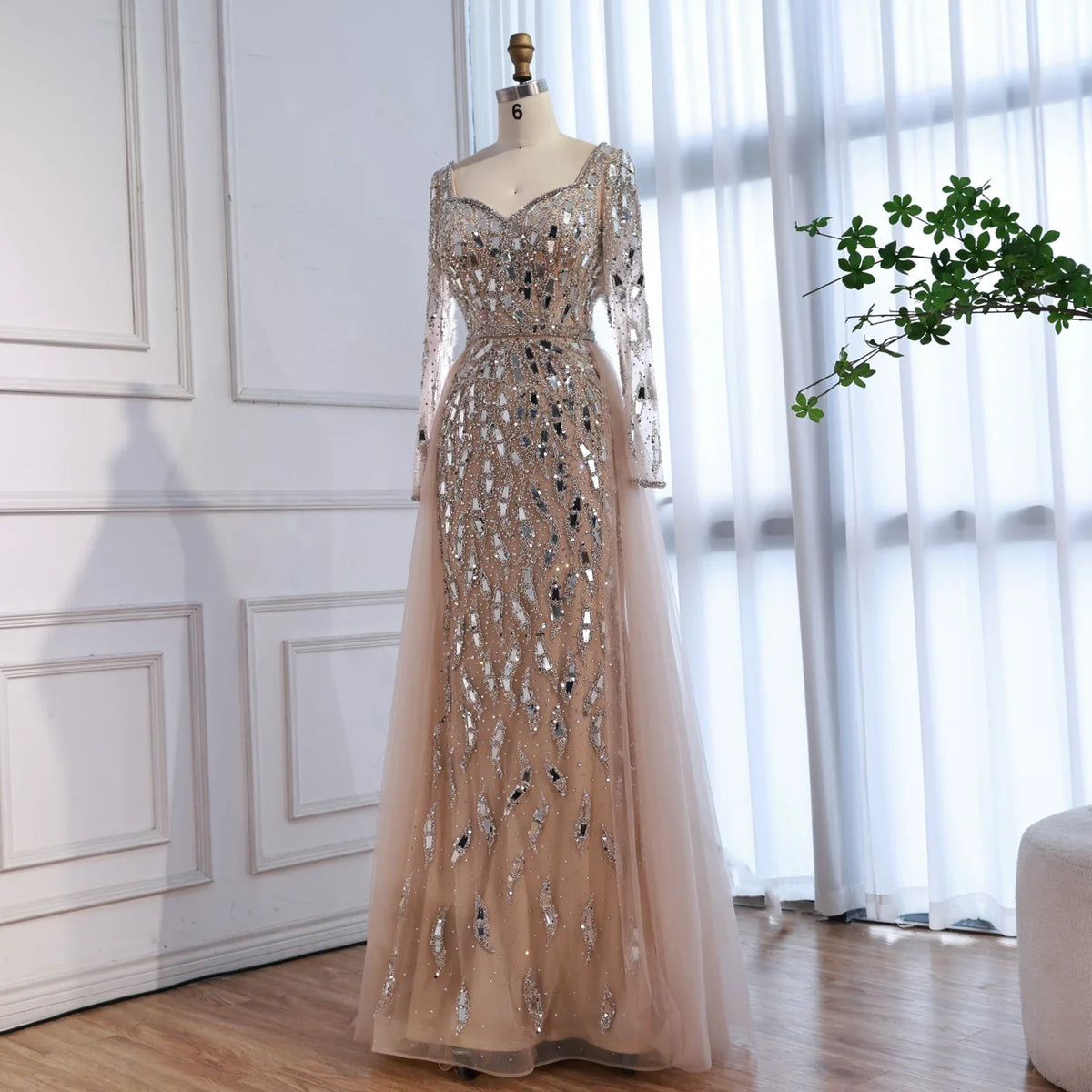 Elegant MC Luxury Arabic dress by MC THE BLACK DIAMOND featuring intricate embroidery and flowing fabric.