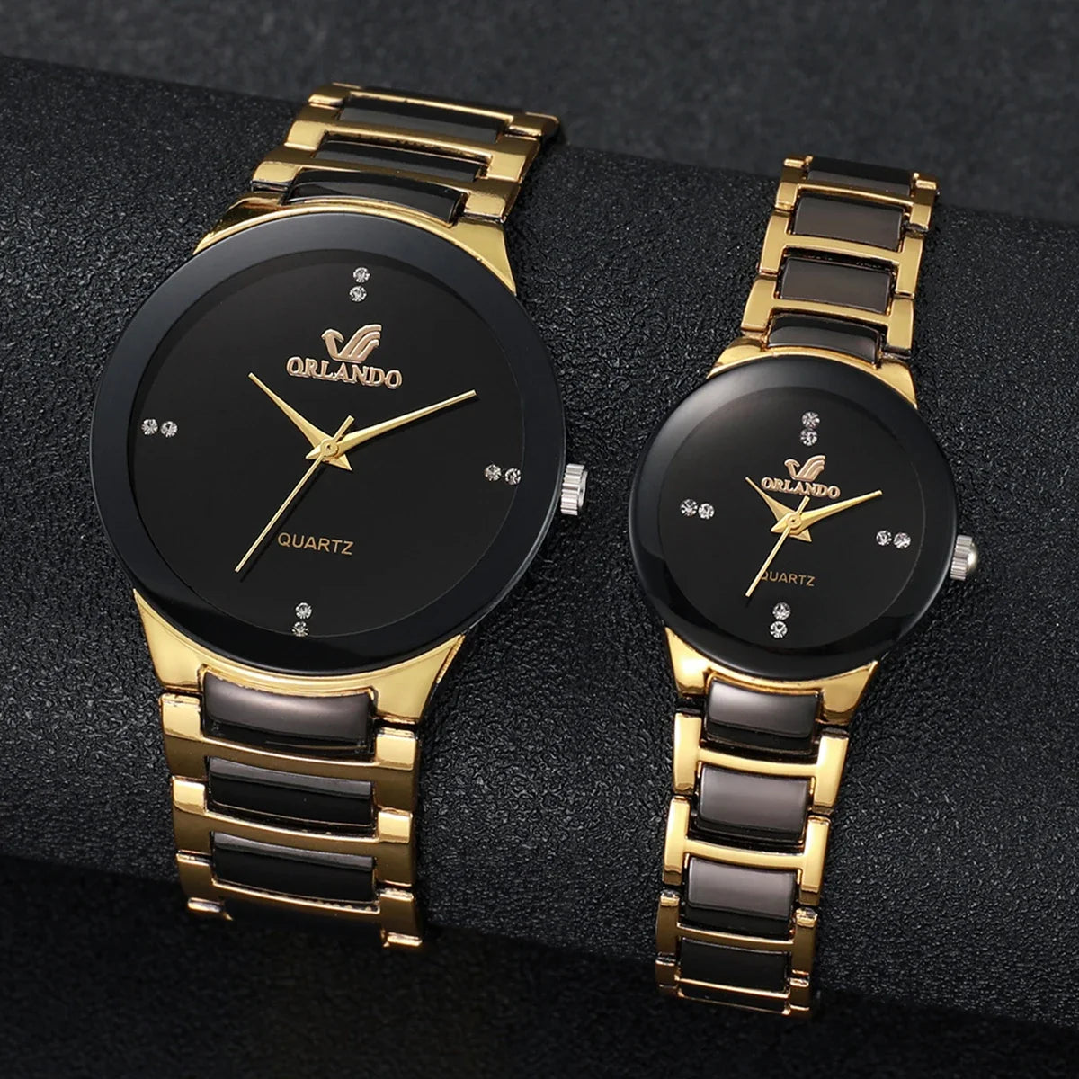 Matching his and hers black diamond watches by MC The Black Diamonds, featuring sleek watch faces and stylish bands.