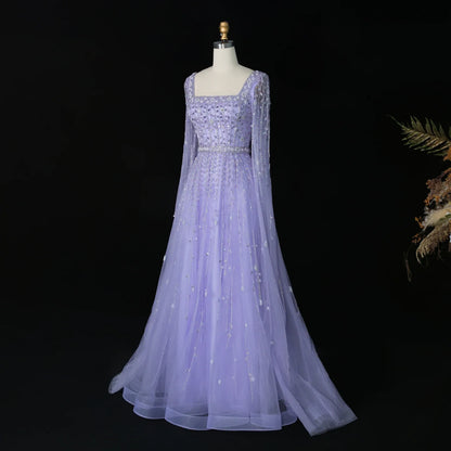 Elegant MC Luxury Pink Dubai Evening Dress by MC THE BLACK DIAMOND featuring a flowing fabric and intricate design.