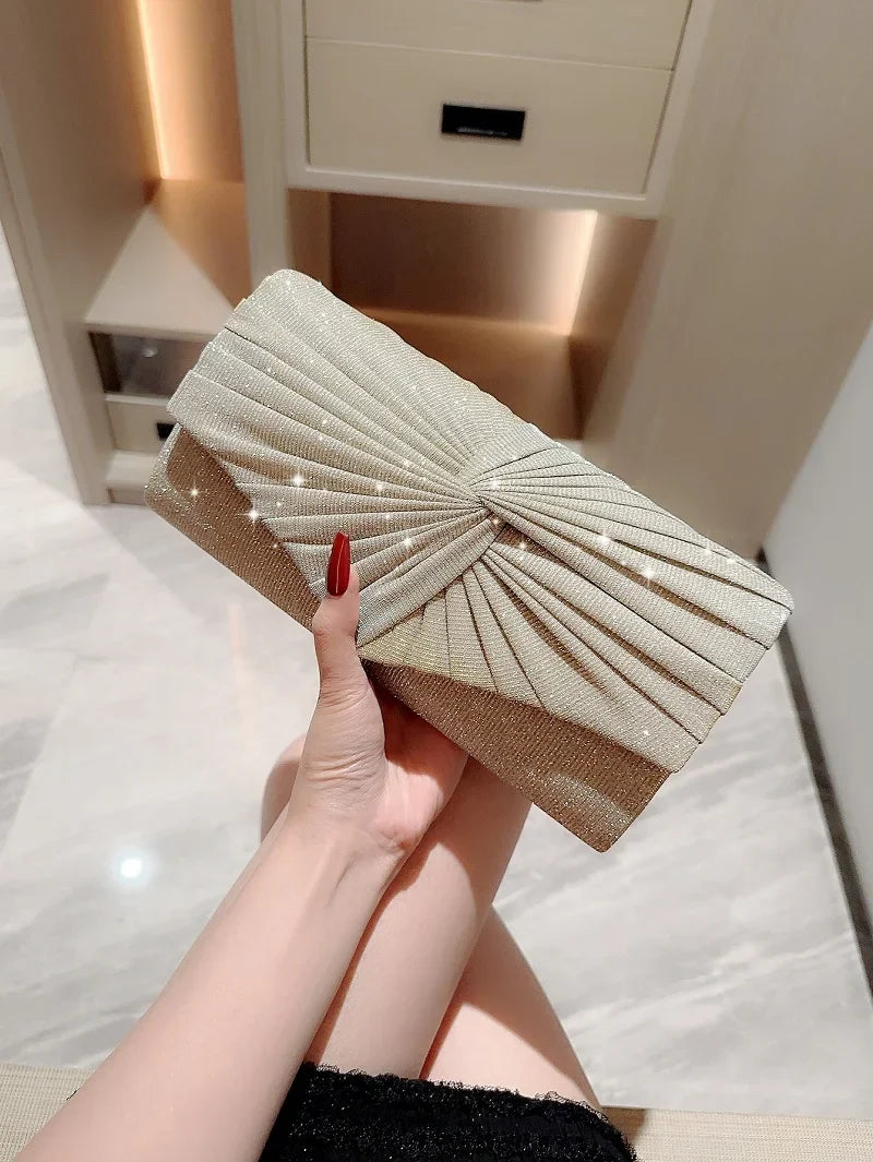 Luxury ladies evening clutch bag from Mohammad Collection, silver dress crossbody bag with shining finish for weddings and parties.