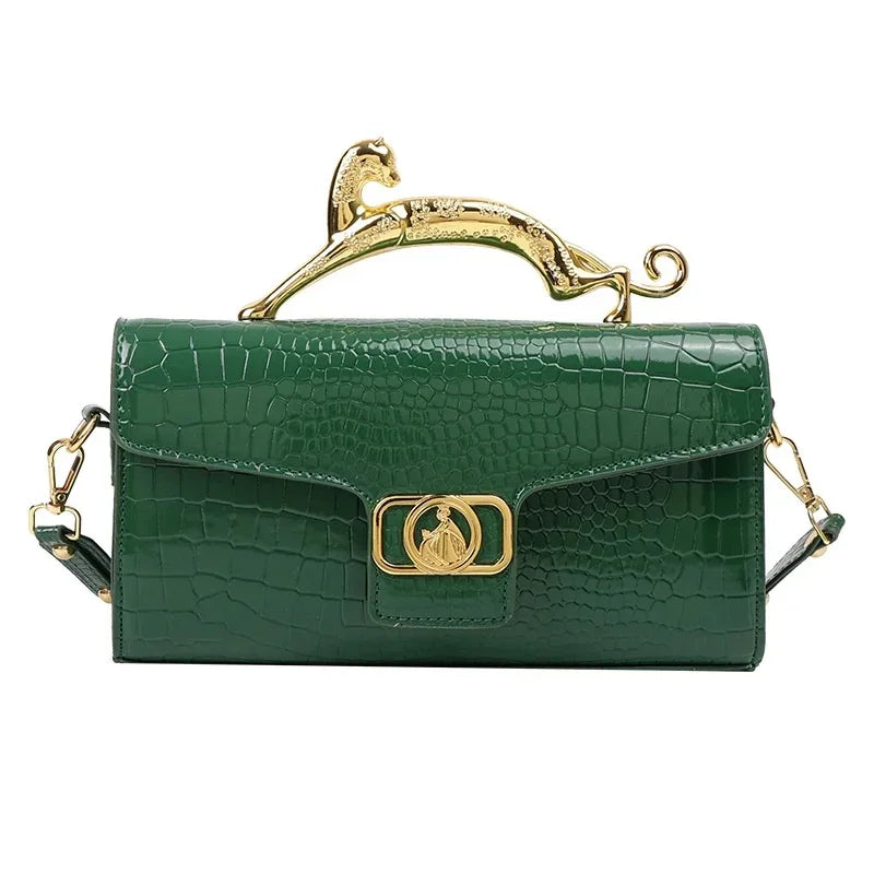 Women’s luxury leather shoulder bag by MC THE BLACK DIAMOND featuring a metal buckle and simple fashion design, perfect for parties.