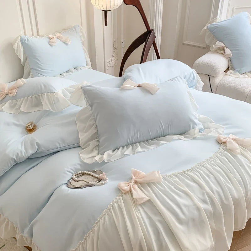 Three-piece white bedding set with ruffled duvet cover from 𝕄𝕔 𝕋𝕙𝕖 𝔹𝕝𝕒𝕔𝕜 𝔻𝕚𝕒𝕞𝕠