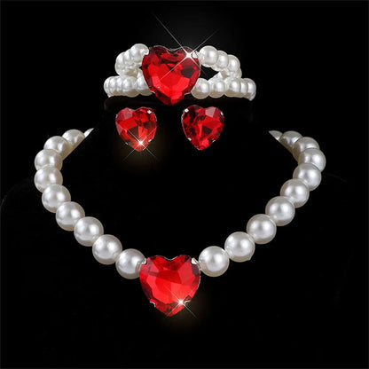 Elegant bridal jewelry set featuring versatile earrings and necklace by MC THE BLACK DIAMOND, displayed on a neutral background.