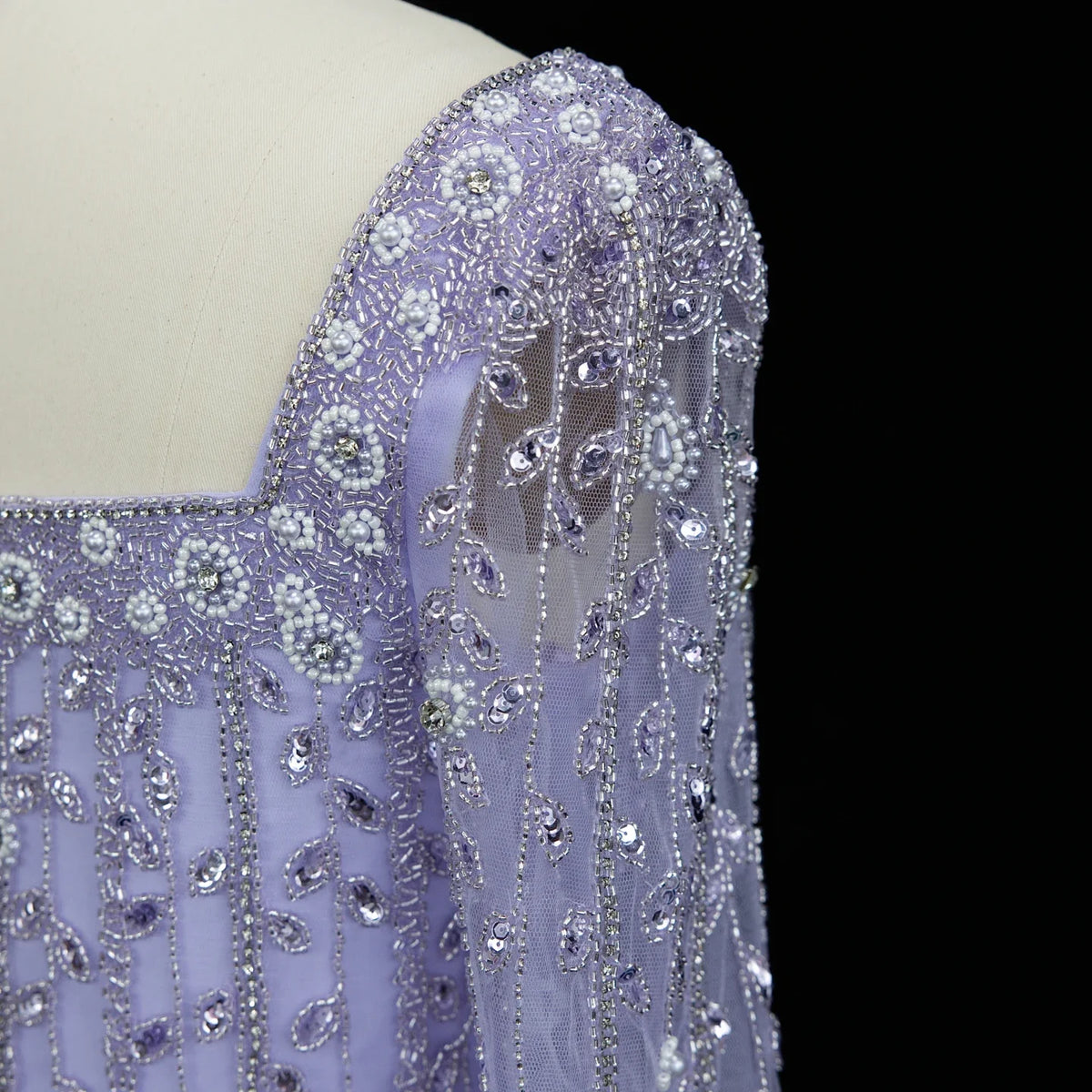 Elegant MC Luxury Pink Dubai evening dress by MC THE BLACK DIAMOND, featuring a flowing design and intricate details.