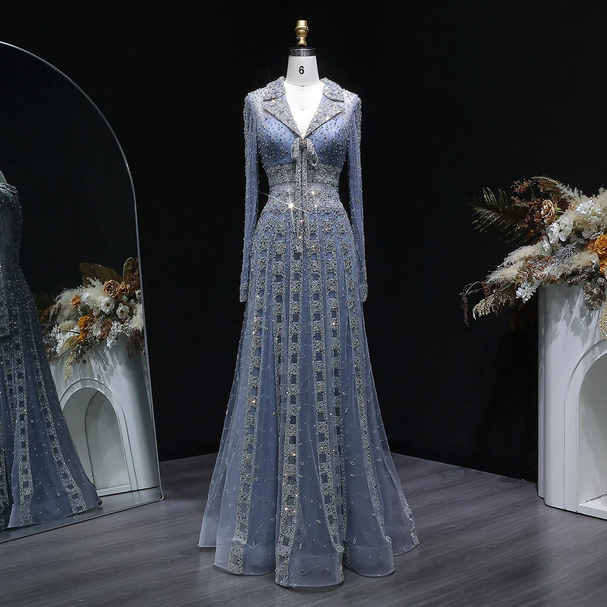 Elegant MC THE BLACK DIAMOND MC brand long sleeve formal evening dress with a sleek design and sophisticated fit.