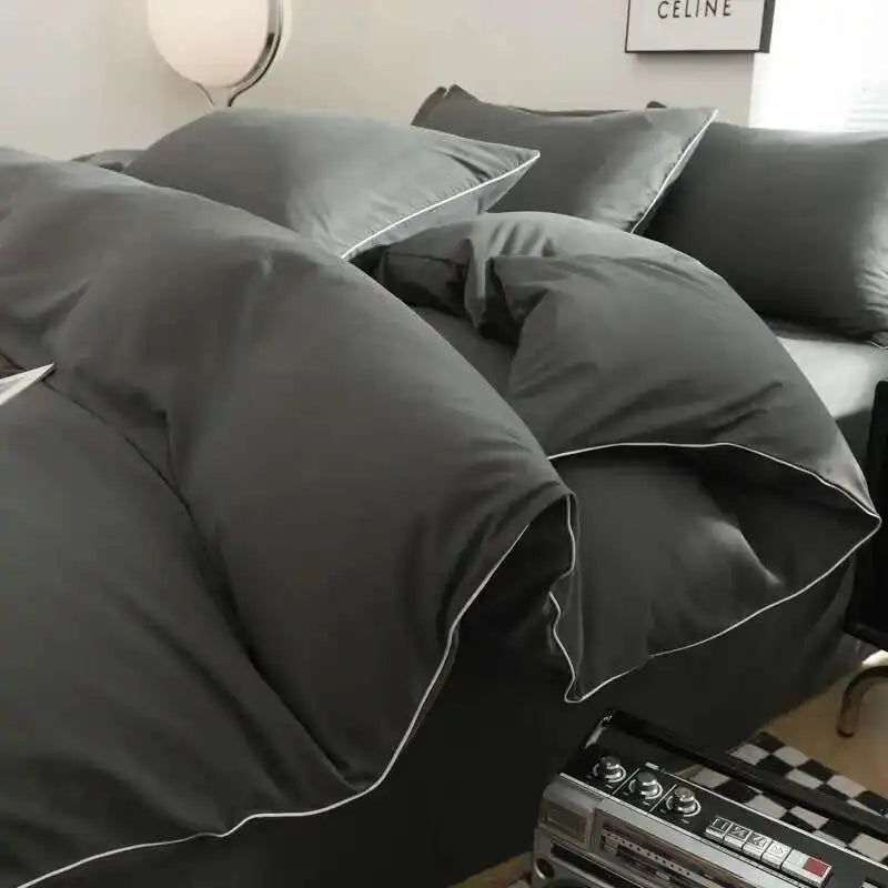 Black bedding set with minimalist quilt design from 𝕄𝕔 𝕋𝕙𝕖 𝔹𝕝𝕒𝕔𝕜 𝔻𝕚𝕒𝕞𝕠𝕟